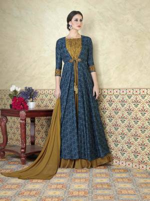 Drape This Steel Blue , Dark Beige Colored Salwar Kameez And Look Pretty Like Never Before. This Beautiful Suits Features A Tussar Silk Paired With Satin Bottom And Chiffon Dupatta.This stylish suit specially for you.Get It Now.