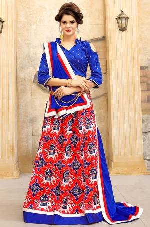Grab This Attractive Printed Lehenga In For Any Simple Function At Your Place. This Lehenga Is In Red Color Paired With Royal Blue Colored Blouse and Dupatta. Its Lehenga And Choli Are Fabricated On Art Silk Paired With Georgette Fabricated Dupatta. It Is Light In Weight And Easy To Carry All Day Long.