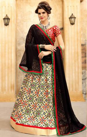 Celebrate This Festive Season Wearing This Simple And Elegant Lehenga Choli In Red Colored Blouse Paired With Off-White Colored Lehenga And Black Colored Dupatta. Its Lehenga And Choli Are Fabricated On Art Silk Paired With Georgette Fabricated Dupatta. It Ensures Superb Comfort All Day Long.