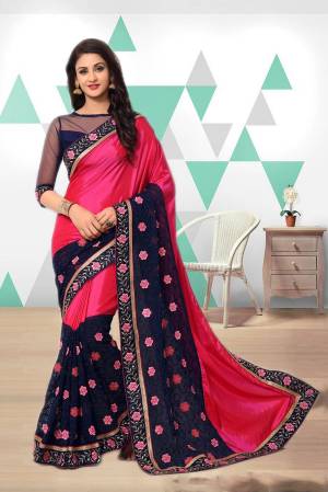 Shine Bright Wearing This Fuschia Pink And Navy Blue Colored Saree Paired With Navy Blue Colored Blouse. This Saree Is Fabricated On Art Silk And Georgette Paired With Art Silk And Net Fabricated Blouse. This Saree Is Beautified With thread Embroidery. 