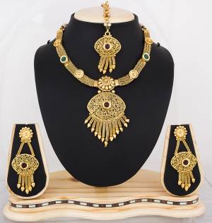 Another Designer Necklace Set Is Here In Golden Color Along With Maang Tika. This Necklace Set Is Light Weight And Easy To Carry All Day Long.