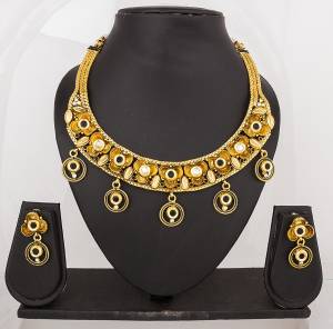 Here Is A New And Unique Patterned Necklace Set In Golden Color Beautified With Stones And Hangings . This Necklace Set will Definetily Earn You Lots Of Compliments From Onlookers.