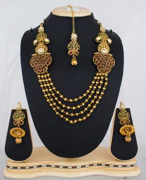 Grab This Beautiful Patterned Layered Chain Necklace In Golden Color Beautified With Stone Work. Buy It now.