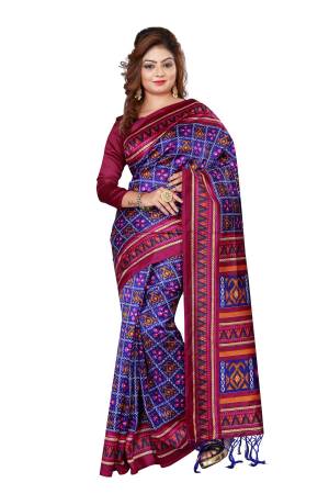 Bright And Visually Appealing, Grab This Saree For Your Semi-Casual Wear In Blue And Wine Color Paired With Wine Colored Blouse. This Saree And Blouse Are Fabricated On Crepe Silk Beautified With Prints All Over It. Grab This Now At A Resonable Rate Before It Goes Out Of Stock.