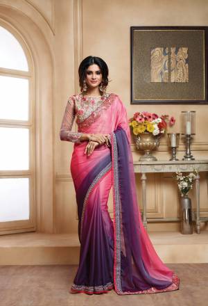 Two Different Shades In One Saree Makes It More Attractive So Grab This Pretty Saree In Shaded Pink And Purple Color Paired With Golden Colored Blouse. This Saree Is Fabricated On Chiffon Paired With Art Silk And Net fabricated Blouse. Buy This Saree Now.
