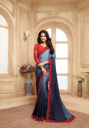 Go With The Shades Of Blue With This Saree In Steel Blue Colored Shades Paired With Contrasting Red Colored Blouse. This Saree Fabricated On Jacquard Georgette Paired With Art Silk And Net Fabricated Blouse. This Saree Ensures Superb Comfort All Day Long.