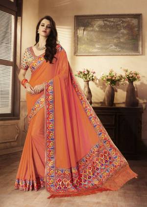 Orange Color Induces Perfect Summery Appeal To Any Outfit So Grab This Designer Saree In Orange Color Paired With Beige Colored Blouse. This Saree Is Fabricated On Handloom art Silk Paired With Art Silk Fabricated Blouse. It Is Beautified With Attractive Geometric Embroidery Over The Blouse And Saree Lace Border.