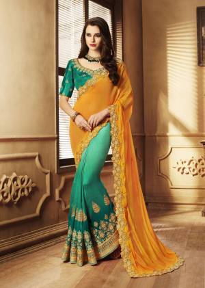 Here Is A Beautiful Combination In Designer Saree With This Saree In Musturd Yellow And Pine Green Color Paired With Pine Green Colored Blouse. This Saree Is Fabricated On Chiffon Dilk Paired With Art Silk Fabricated Blouse. Both The Fabrics Ensures Superb Comfort All Day Long.