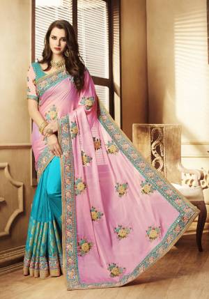 Look Pretty Wearing This Saree In Pink And Blue Color Paired With Blue Colored Blouse. This Saree Is Fabricated On Silk Georgette And Jacquard Silk Paired With Art Silk And Georgette Fabricated Blouse. Its Beautiful Color And Designer Will Earn You Lots Of Compliments From Onlookers.