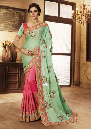 Particular About Colors Than Grab This Pretty Combination Saree In Sea Green And Pink Color Paired With Dark Pink Colored Blouse. This Saree Is Fabricated On Silk Georgette And Jacquard Silk Paired With Art Silk And Georgette Fabricated Blouse. Its And Fabrics Are Making The Saree more Attractive.