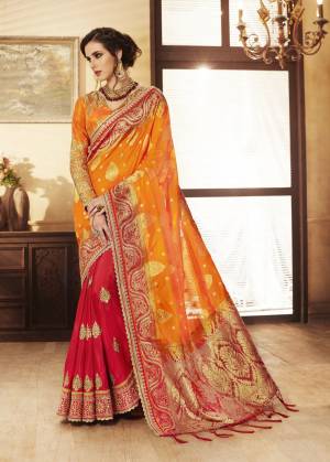 Orange And Red Color Induces Perfect Summery To Any Outfit So Grab This Designer Saree In Orange And Red Color Paired With Red Colored Blouse. This Saree Is Fabricated On Jacquard Silk And Handloom Art Silk Which Gives A Rich Look To Your Personality. Buy It Now.