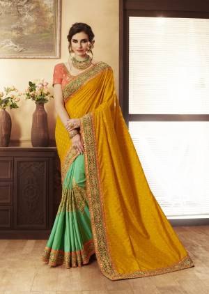 Colors Adds Beauty To Any Attire and Your Personality. So Grab This Saree In Musturd Yellow And Sea Green Color Paired With Contrasting Orange Colored Blouse. This Saree Is Fabricated On Jacquard Silk And Handloom Art Silk Paired With Art Silk Fabricated Blouse. It Is Easy To Drape And Also Carry All Day Long.