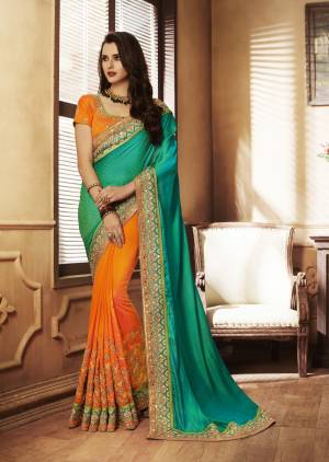 Add This Designer Saree To Your Wardrobe In Blue And Orange Color Paired With Orange Colored Blouse. This Saree Is Fabricated On Handloom Art Silk Paired With Art Silk Fabricated Blouse. This Beautified With Elegant Embroidery Over The Saree and blouse.