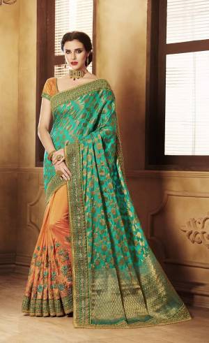 A Very Rare And Unique Combination Is Here With Designer Saree In Blue And Orange Color Paired With Orange Colored Blouse. This Saree Is Fabricated On Jacquard Silk And Handloom Art Silk Paired With Art Silk Fabricated Blouse. It Has Beautiful Weave Over The Pallu And Embroidery Over The Saree Panel. Buy This Saree Now.