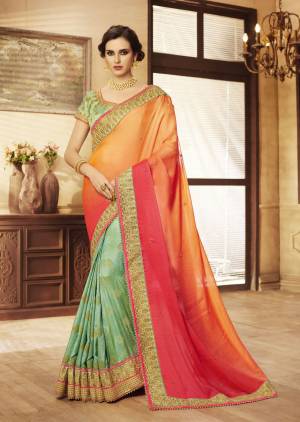 New And Unqiue Combination Is Here In This Designer Saree In Orange And Mint Green Color Paired With Mint Green Colored Blouse. This Saree Is Fabricated On Crush Georgette Paired With Art Silk Fabricated Blouse. It Is Beautified With Weave And Embroidery. Buy Now.