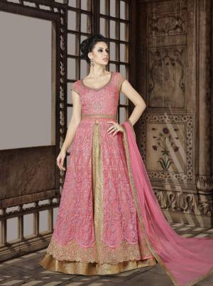 Look Pretty In This Pretty Pink Colored Designer Floor Length Suit. Its Top Is In Pink Color Paired With Beige colored Lehenga And Pink Colored Dupatta. Its Top Is Fabricated On Net Paired With Brocade Lehenga And Net Dupatta. Buy This Indo-Western Suit Now.