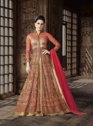 Bright And Visually Appealing Indo-Western Suit Is Here In Orange Color Paired With Golden Colored Lehenga And Orange Colored Dupatta. Its Top Is fabricated On Net Paired With Art Silk Lehenga And Net Dupatta. This Floor Length Suit Is Suitable For All Occasion. Buy This Now.