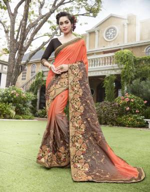 Elegant Combination Is Here With This Designer Saree In Orange And Brown Color Paired with Brown Colored Blouse. This Saree And Blouse Are Fabricated On Art Silk. Its Fabrics Ensures Superb Comfort All Day Long.