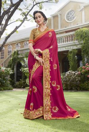 Shine Bright Wearing This Saree In Dark Pink Color Paired With Golden Colored Blouse. This Saree Is Fabricated On Silk Georgette Paired With Art Silk Fabricated Blouse. It Is Light In Weight And Easy To Carry All Day Long.