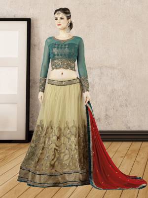 Grab This Beautiful Designer Lehenga Choli For The Next Wedding. Its Blouse Is In Teal Blue Color Paired With Mint Green Colored Lehenga And Contrasting Red Colored Dupatta. This Lehenga And Choli are Fabricated On Net  Paired With Chiffon Fabricated Dupatta. It Is Light In Weight And Easy To Carry Throughout The Gala.