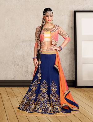 Go Colorful With This Designer Lehenga Choli In Pink And Yellow Colored Blouse Paired With Blue Colored Lehenga And Orange Colored Dupatta. Its Blouse And Lehenga Are Fabricated On Art Silk Paired With Chiffon Fabricated Dupatta. It Has Pretty Embroidery Over The Lehenga And Blouse Neckline. Buy This Now.
