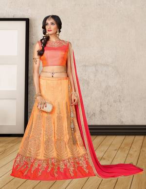 Celebrate This Festive Season wearing This Designer Lehenga Choli In Orange Color Paired With Contrasting Pink Colored Dupatta. Its Blouse And Lehenga Are Fabricated On Art Silk Paired With Chiffon Dupatta. Buy This Designer Lehenga Now.