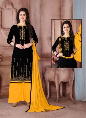 Enhance Your Beauty Wearing This Black Colored Straight Suit Paired With Yellow Colored Bottom And Dupatta. Its Top Is Fabricated On Cambric Cotton Paired With Cotton Bottom And Chiffon Dupatta. Get This Stitched As Per Your Desired Fit And Comfort. Buy Now.