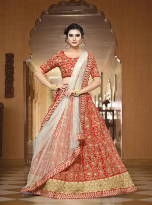 Adorn The Angelic Look Wearing This Pretty Red Colored Lehenga choli Paired With White Colored Dupatta. This Lehenga Choli Is Fabricated On Art silk Paired With Net Fabricated Dupatta. It Has Heavy Intricate Embroidery All Over The Lehenga And Choli. This Lehenga Choli Will Earn You Lots Of Compliments From Onlookers.