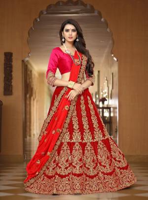Shine Bright With This Designer lehenga Choli In Dark Pink Colored Blouse Paired With Red Colored Lehenga And Dupatta. Its Blouse Is Fabricated On Art Silk Paired With Velvet Lehenga And Chiffon Dupatta. Its All Three Fabrics Ensures Superb Comfort All Day Long. Buy This Lehenga Choli Now.
