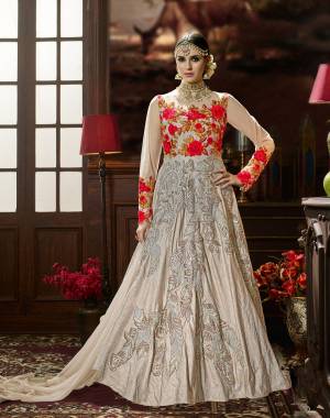 Here Is A Rich And Elegant Looking Floor Length Designer Suit In Grey Color Paired With Grey Colored Bottom And Dupatta. Its Top Is Fabricated On Art Silk Paired With Santoon Bottom And Chiffon Dupatta. It Has Tone To Tone Embroidery And Attractive Embroidery With Contrasting Red Color. Buy This Designer Suit Now.
