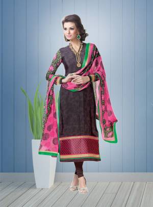 Add This New And Unique Color To Your Wardrobe With This Suit In Wine Color Paired With Contrasting Pink Colored Dupatta. Its Top And bottom Are Fabricated On Crepe Paired With Chiffon Dupatta. It Enusres Superb comfort All Day Long.