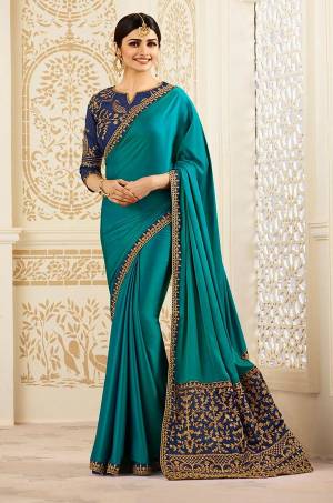 Go With The Shades Of Blue With This Saree In Blue Color Paired With Navy Blue Colored Blouse. This Saree Is Fabricated On Silk Paired With Art Silk Fabricated Blouse. It Is Beautified With Embroidery Over The Pallu And Blouse. 