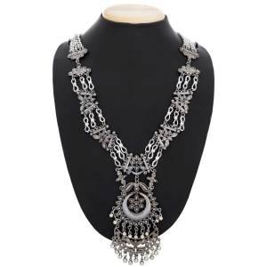 Grab This Pretty Oxidized Necklace Which Can Be Paired with Any Traditonal Wear Or Even A Simple Kurti. It Is In Silver Color And Long Necklace.