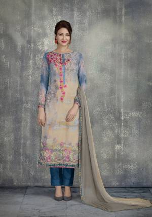 Flaunt Your Rich And Elegant Taste Wearing This Straight Cut suit In Blue And Cream Color Paired With Blue Colored bottom And Grey And Cream Colored Dupatta. Its Rich Colors And Elegant Design Will Earn you Lots Of Compliments From Onlookers. 