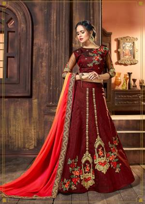 Flaunt Your Rich Taste Wearing This Lehenga Choli In Maroon Color Paired With Pink And Orange Colored Dupatta. Its Blouse And Lehenga Are Fabricated On Art Silk Paired With Satin Fabricated Dupatta. Its Rich Color And Fabric Will Earn You Lots Of Compliments from Onlookers. Buy This Deisgner Lehenga Choli Now.