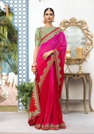 Attract All Wearing This Saree In Dark Pink Color Paired With Contrasting Green Colored Blouse. This Saree Is Fabricated On Georgette Paired With Art Silk Fabricated Blouse. Its Elegant Embroidery Will Earn You Lots Of Compliemnst From Onlookers.