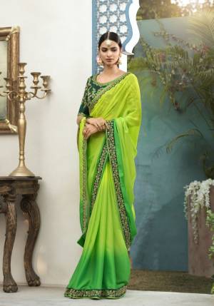 Feel Fresh Everytime You Wear This Beautiful Designer Saree In Green Color Paired With Pine Green Colored Blouse. This Saree 