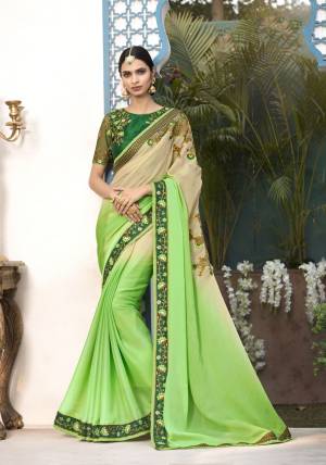Shades Are Always In, So Grab This Shaded Saree In Green And Beige color Paired With Dakr Green Colored Blouse. This Saree Is Fabricated On Chiffon Paired With Art Silk Fabricated Blouse. It Is Light Weight And Ensures Superb Comfort All Day Long.