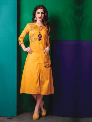 Shine Bright Wearing This Kurti In Yellow Color Which Gives A Very pretty Ethnic Look To Your Personality. This Kurti Is Fabricated On Cotton Beautified With Multi Colored Thread Work.