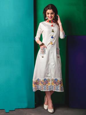 Simple And Elegant Looking Kurti Is Here In White Color Fabricated On Cotton. This Kurti Is Beautified With Multi Colored Thread Work. It Is Light In Weight And Can Be Paired With Any Contrasting Colored Leggings.