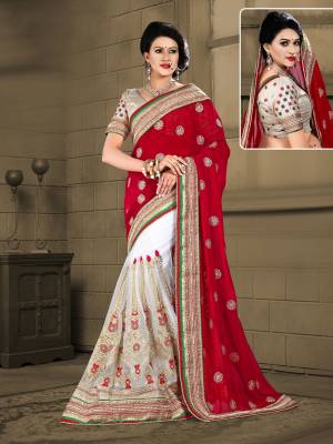 Grab This Rich Looking Saree In Red And White Color Paired With Golden Colored Blouse. This Saree Is Fabricated On Georgette And Net Paired With Paired With Gota Fabricated Blouse. It Is Light Weight And Easy To Carry All Day Long.