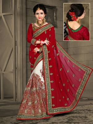 Adorn The Beautiful Queen Look Wearing This Saree In Maroon And White Color Paired With Maroon Colored Blouse. This Saree Is Fabricated On Georgette Paired With Gota Fabricated Blouse. It Is Durable And easy To Carry For.