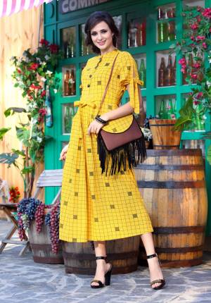 New And Unique Patterned Kurti Is Here In Lovely Yellow Color Fabricated On Khadi Cotton. Its Pretty Small Checks Detailing And Knot Pattern Over the Sleeves Waist Is Giving A Tredny Look To This Kurti. Buy This Readymade Kurti Now.