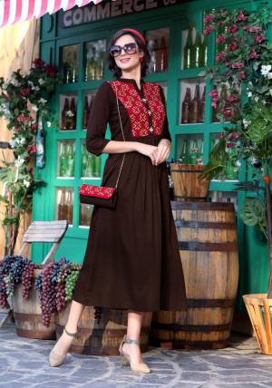 Grab This Simple Kurti In Brown Color Fabricated On Cotton Beautified With Neck Pattern. This Kurti Is Suitable For Any Occasion As Per Your Convinince. Buy This Designer Readymade Kurti Now.