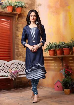 Grab This Kurti For Your Casual Wear In Blue Color Fabricated On Soft Denim. It Is Beautified With Polka Dota Prints. This Kurti Can Be Paired With Blue Or White Colored Leggins.