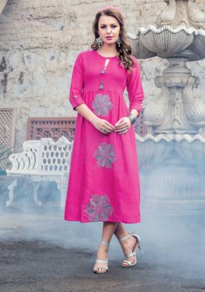 Look Pretty Wearing This Pink Colored Readymade Kurti Fabricated On Art Silk Beautified With Contrasting Thread Embroidered Patch Work. This Kurti Is Light In Weight And Easy To Carry All Day Long. 