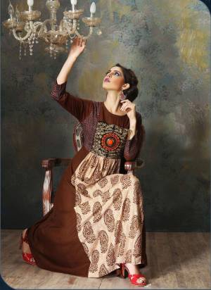 Look Traditonal Wearing This Kurti In Brown Color Fabricated On Rayon Cotton. This Kurti Is Beautified With Prints And Thread Work , Also Its Fabric Which Is Soft Towards Skin Ensures Superb Comfort All Day Long.