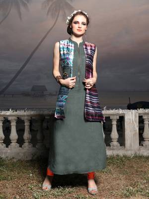 Grab This Deaigner Jacket Patterned Kurti In Grey And Multi Colored. This Kurti Is Fabricated On Satin And Art Silk Beautified With Prints Over The Jacket. Buy This Readymade Kurti Now.