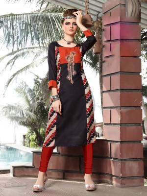 Enhance Your Beauty Wearing This Kurti In Black Color Fabricated On Rayon Cotton. This Kurti Is Beautified With Prints Over The Sides And Embroidery Over It Yoke. Buy This Pretty Kurti Now.