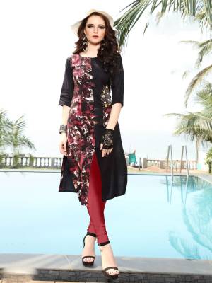 Enhance Your Beauty Wearing This Kurti In Black Color Fabricated On Rayon Cotton. This Kurti Is Beautified With Prints Over One Side And Embroidery Over The Other. Buy This Pretty Kurti Now.
